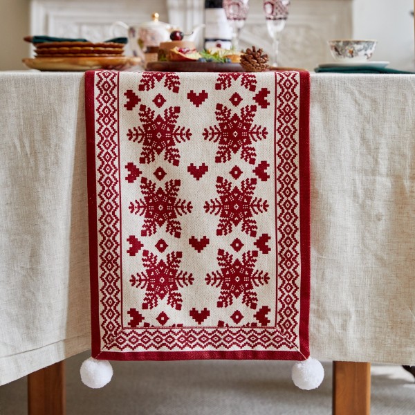 Red snowflake table runner