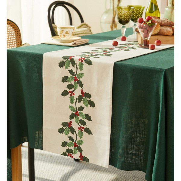 Table runner with Christmas holly pattern