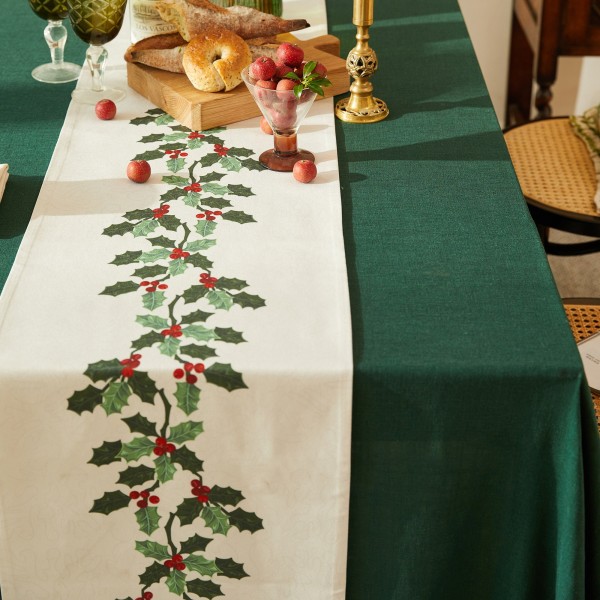 Table runner with Christmas holly pattern
