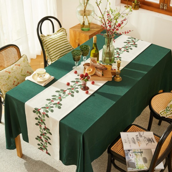 Table runner with Christmas holly pattern