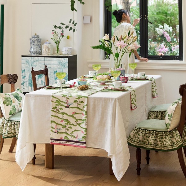 Green table runner with natural elements theme