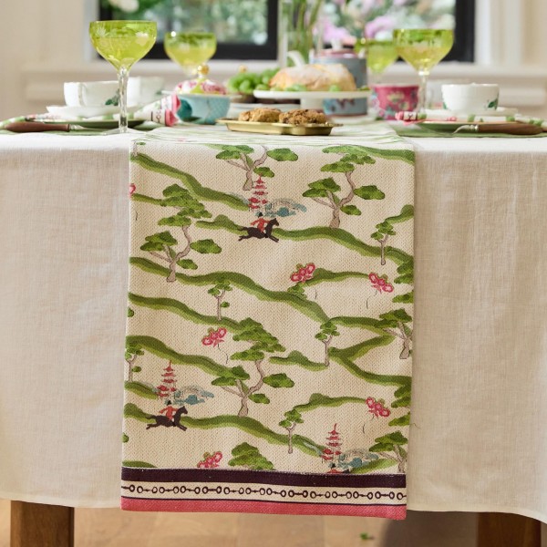 Green table runner with natural elements theme