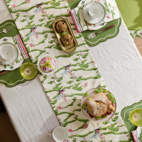 Green table runner with natural elements theme