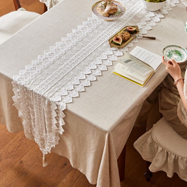 White cotton lace table runner with cutout details