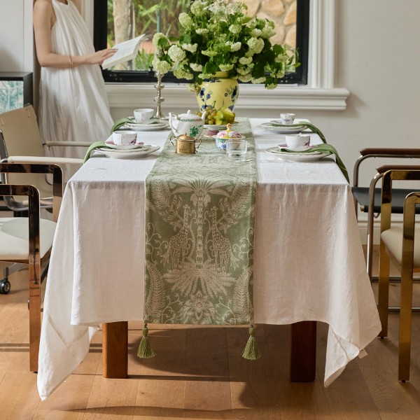 Intricate floral and deer patterned table runner